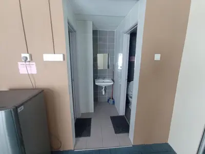 a small bathroom with a sink and a toilet at DarulMakmur Apartment in Brinchang