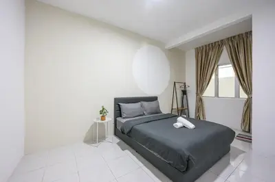 a bedroom with a bed and a large window at Cool Climate Comfort Brinchang Cameron Highlands Holiday Clover Home 4-27 in Brinchang