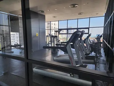 a gym with cardio equipment in a building at Tropicana 218 Macalister #LuxuryFrenchVintage #InfinityPool #Studio2pax #Quality well maintained #Private host in George Town