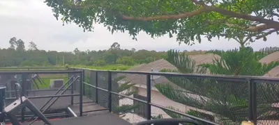 a view from the top of a balcony of a house at Casa Studio Roomstay Sekinchan in Sekincan