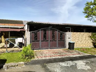 a house with a gate in front of it at RJ design homestay in Kampong Batu Lapan