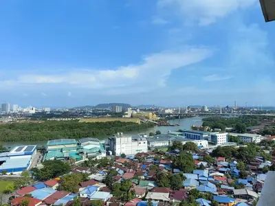 an aerial view of a city with a river and buildings at Warmth Nest4U Homestay Butterworth in Butterworth