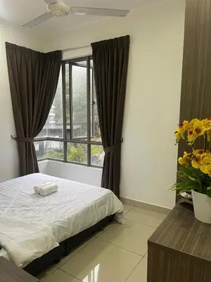 a bedroom with a bed and a window at Ereens homestay 3 Palas horizon in Cameron Highlands