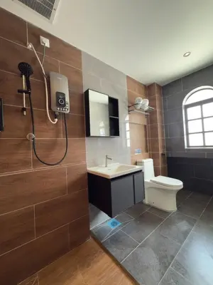 a bathroom with a shower and a toilet and a sink at LYL Ipoh Garden Private Pool Villa-18pax 5BR in Ipoh