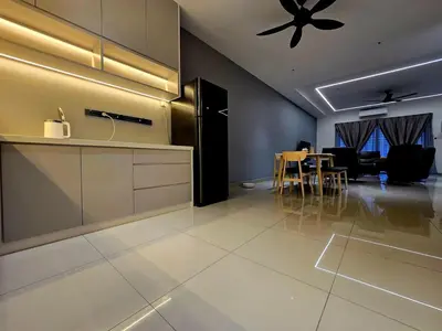 a kitchen and dining room with a ceiling fan at The Cozy 88 ipoh & in Ipoh