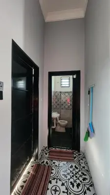 a bathroom with a shower and a toilet at Yash Cottage Taiping Homestay in Taiping