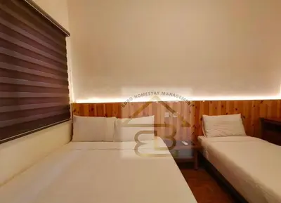 two beds in a small room with two beds sidx sidx at 188 Private Pool Mansion Ipoh KTV BBQ 30Pax in Ipoh