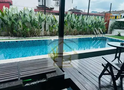 a view of a swimming pool with a table and a patio at 188 Private Pool Mansion Ipoh KTV BBQ 30Pax in Ipoh