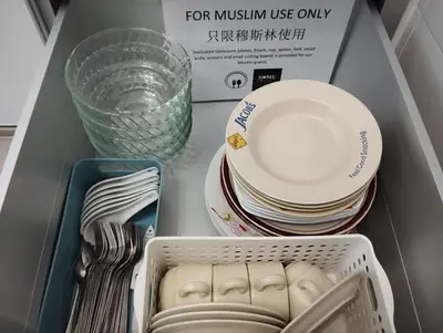 a drawer filled with dishes and plates and a box at Ipoh Home Story Newly Renovated Bercham Landed Double Storey For 10pax in Ipoh