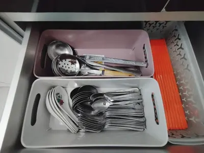 a white drawer filled with dishes and utensils at Ipoh Home Story Newly Renovated Bercham Landed Double Storey For 10pax in Ipoh