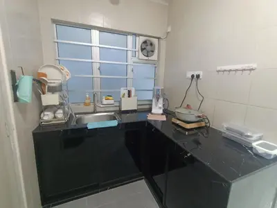 a kitchen counter with a sink and a window at Dream 7 at Emerald avenue in Brinchang