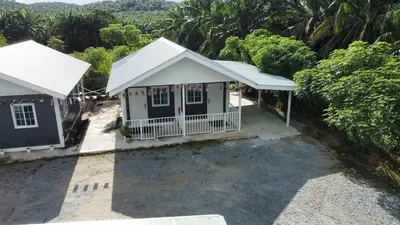 an aerial view of a small house with trees at al Hajari Inn - For Islam Only - Kg Banggol Batu Lenggong in Kampong Banggol Belimbing