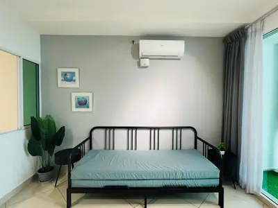 a bedroom with a bed with a blue mattress at Mansion One l 7pax 2R1B l Seaview l Gleneagles l by PerfectSweetHome in George Town
