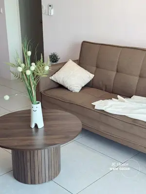 a living room with a couch and a coffee table at Meritus Residence 4min to Penang Bridge in Perai