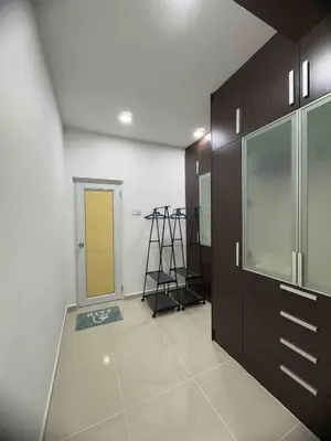 a room with a door and a yellow door in a room at 25 pax Golf Resort Private Villa in Kulim