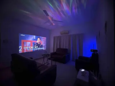 a living room with a couch and a tv at 25 pax Golf Resort Private Villa in Kulim