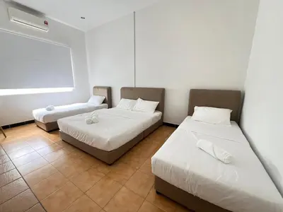 a room with two beds and a window at MyRoom-Victoria, near to Island,LGL,Jln Burmah in George Town