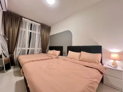 a bedroom with two beds and a window at Stay at Anderson Condo1615 Ipoh Town in Ipoh