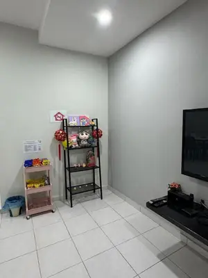a living room with a flat screen tv and a shelf at 16 pax HB Homestay Raja Uda Ong Yi How Butterworth - Budget Homestay - KTV NETFLIX MAHJONG in Butterworth