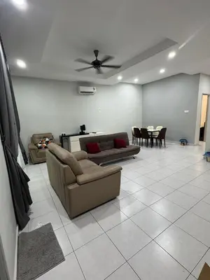 a living room with a couch and a table at 16 pax HB Homestay Raja Uda Ong Yi How Butterworth - Budget Homestay - KTV NETFLIX MAHJONG in Butterworth