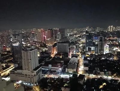 a view of a city at night at Infinitum suites at colony KLCC in Gua Sai