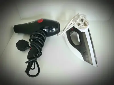 a hair dryer and a pair of scissors on a counter at Beacon Executive Suite Penang George Town in George Town