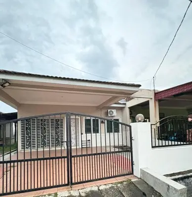 a house with a gate in front of it at Ummu Homestay 03 in Batu Gajah