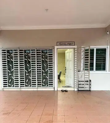 an empty room with a door and a room with a door at Ummu Homestay 03 in Batu Gajah