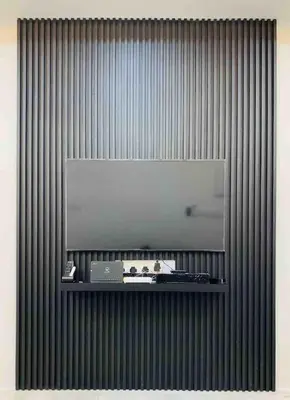 a television on a wall with a shelf at Love birds Abbie's Private Pool Villa 2 pax in Bukit Mertajam