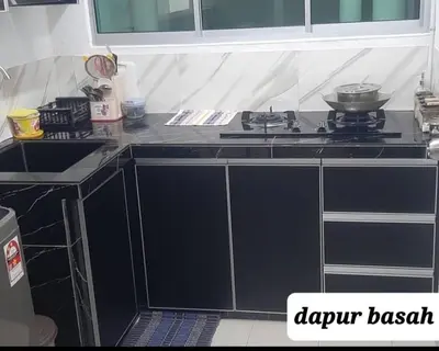 a kitchen with a stove and a counter top at D'PrimaVerra in Ipoh
