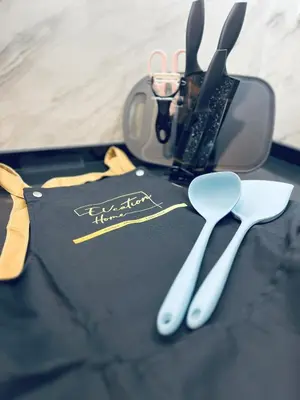 a pair of scissors sitting on top of a table at Sunway Onsen Ipoh by EUcation Home in Tambun
