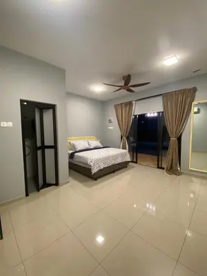 a bedroom with a bed and a ceiling fan at Untung5tay in Gua Sai
