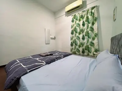 a hospital room with a bed and a curtain at Modern Casual Style Haus 4Room`````Alma in Bukit Mertajam