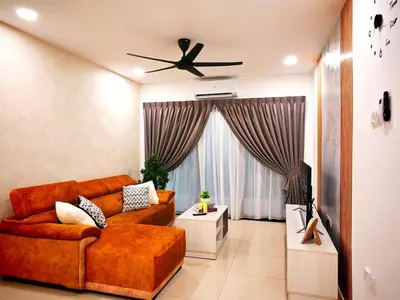a living room with a couch and a ceiling fan at Ipoh Manhattan Waterpark Suite by City Home Empire MHA306 in Ipoh