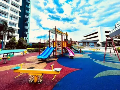 a playground with a slide and slidesktop at Ipoh Manhattan Waterpark Suite by City Home Empire MHA306 in Ipoh