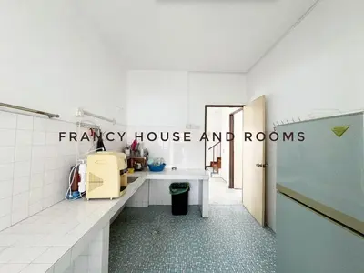 a bathroom with a sink and a counter in a room at Nanyang Style Home In Ipoh in Ipoh