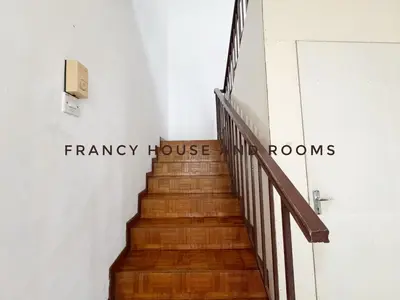 a staircase with the words francy house and rooms at Nanyang Style Home In Ipoh in Ipoh