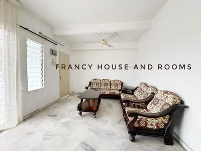 a living room with two chairs and a couch at Nanyang Style Home In Ipoh in Ipoh
