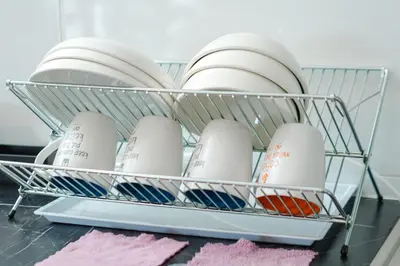 a shopping basket filled with plates and bowls at L13 Cozy Corner The Horizon Ipoh in Ipoh