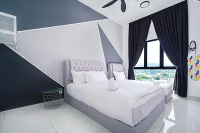 a bedroom with a large white bed and a window at L13 Cozy Corner The Horizon Ipoh in Ipoh