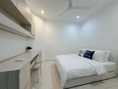 a white bedroom with a bed and a desk at 10Pax BM\u5927\u5c71\u811a Alma Single storey Semi-D 5-minute To Aeon Mall in Bukit Mertajam