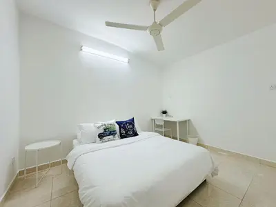 a white bedroom with a bed and a ceiling fan at 10Pax BM\u5927\u5c71\u811a Alma Single storey Semi-D 5-minute To Aeon Mall in Bukit Mertajam