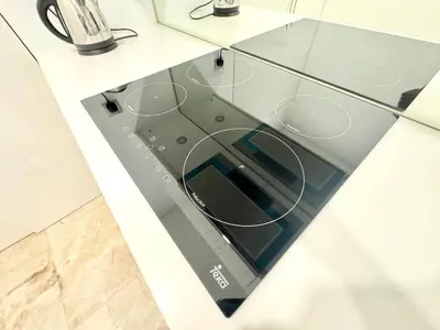 a glass cabinet with a stove top on a counter at Sky Suites Peaches 2BR nearby KLCC in Gua Sai