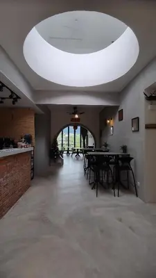 a large room with tables and a large white ceiling at Sunya Home Ground Floor Raub Pahang in Raub