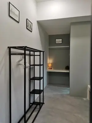 a room with a book shelf and a ladder at Sunya Home Ground Floor Raub Pahang in Raub