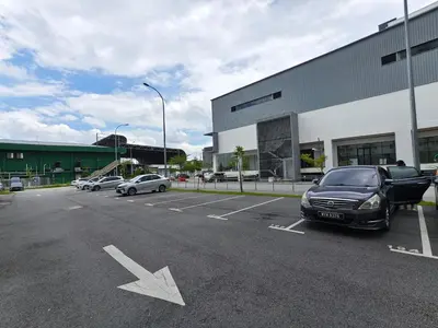 a car parked in a parking lot in front of a building at Unisuites Kampar 5 min UTAR & TARC -1 BR 3pax PetFriendly, 1 Carpark & Netflix I High Floor Unblock Mountain View in Kampar