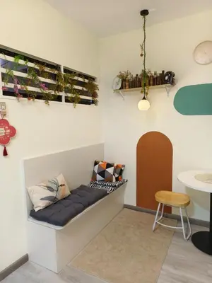 a bench in the corner of a room at Unisuites Kampar 5 min UTAR & TARC -1 BR 3pax PetFriendly, 1 Carpark & Netflix I High Floor Unblock Mountain View in Kampar