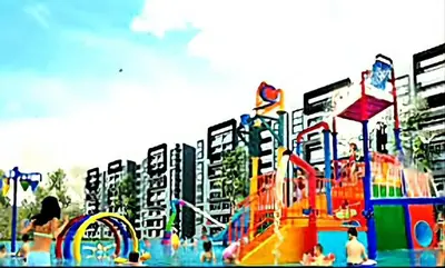 a playground with a water park with buildings in the background at Ipoh Manhattan Waterpark Suite by City Home Empire MHB403 in Ipoh