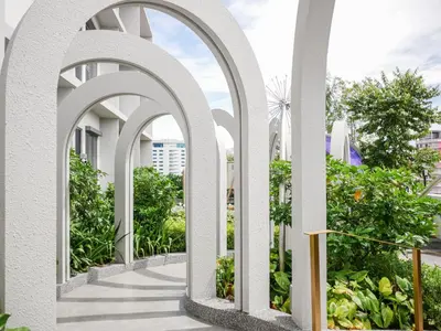 an archway over a walkway on a building at 22 Macalisterz by MyKey in George Town