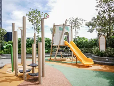 a playground with a yellow slide and a slideintend at 22 Macalisterz by MyKey in George Town